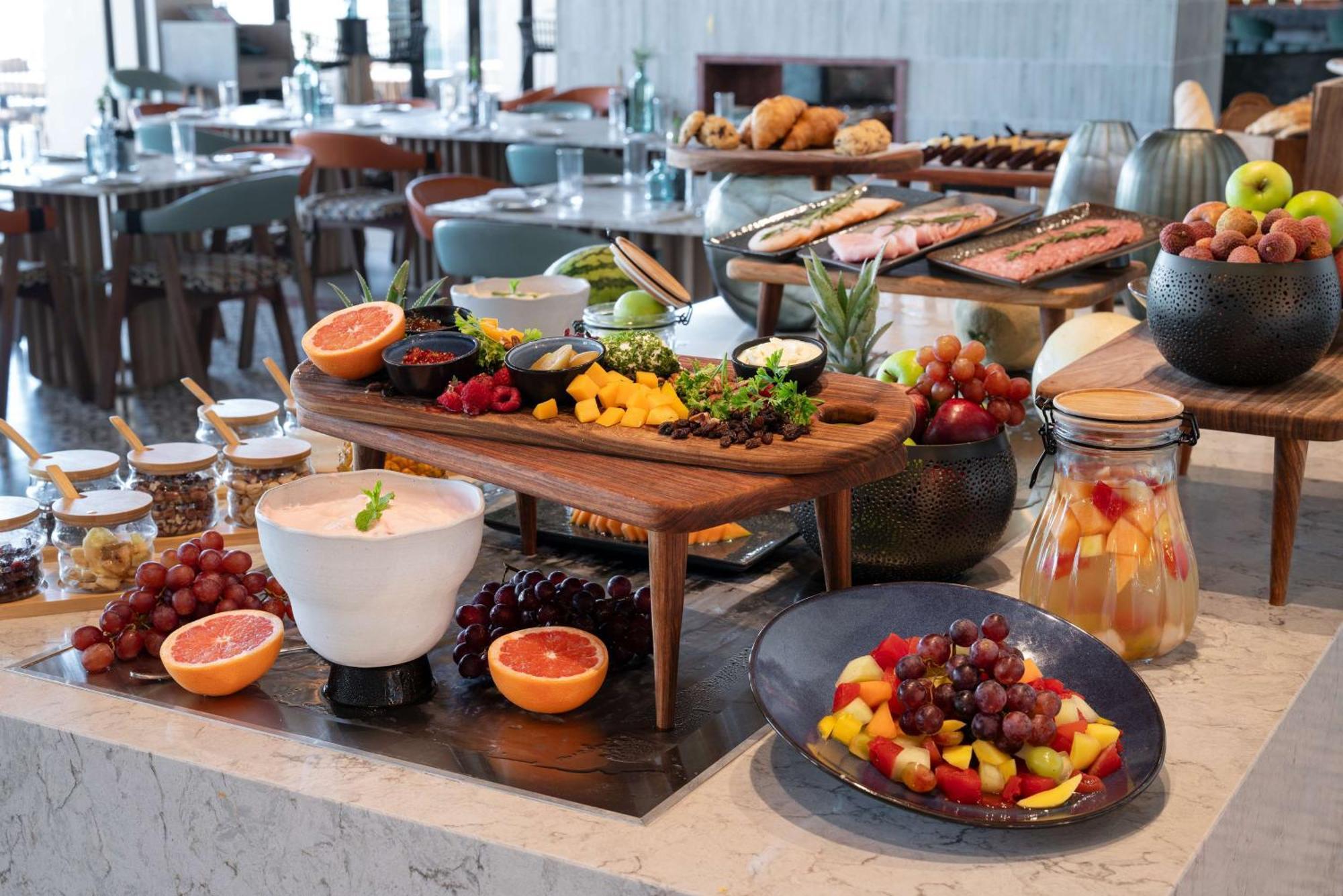 Radisson Safari Hotel Hoedspruit Exterior photo A fruit salad buffet